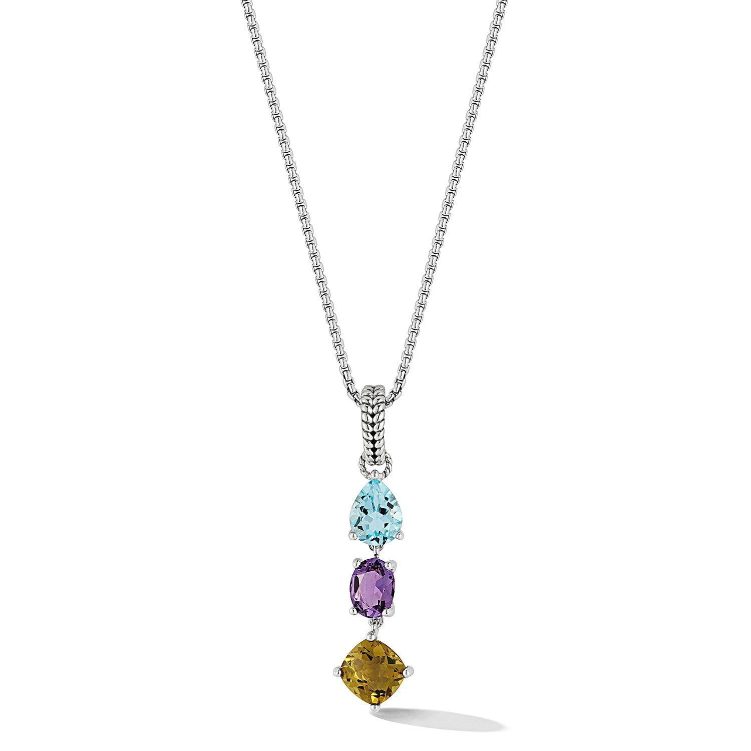Our Sterling Silver Multi Gemstone Pendant Necklace in Sea features pear Sky Blue Topaz, oval Amethyst and cushion Olive Quartz. The gemstone trio dangle from a 1.6mm Box Chain Necklace with a Box Cha