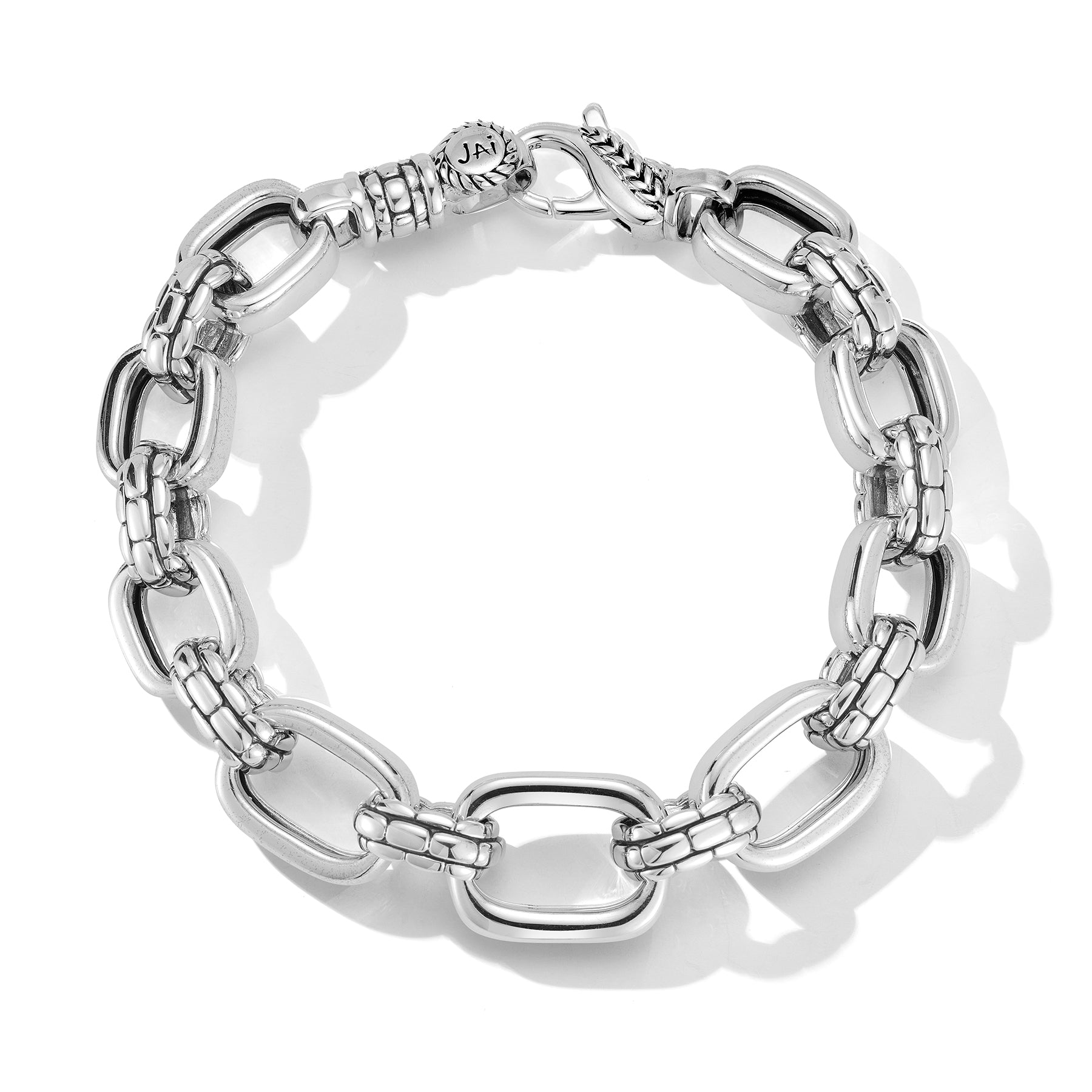 Our Sterling Silver Statement Link Bracelet features graduated rectangular links, which alternate with Box Chain element links for textural contrast.Sizes:Large (8.125"" Length)Medium (7.625"" Length)