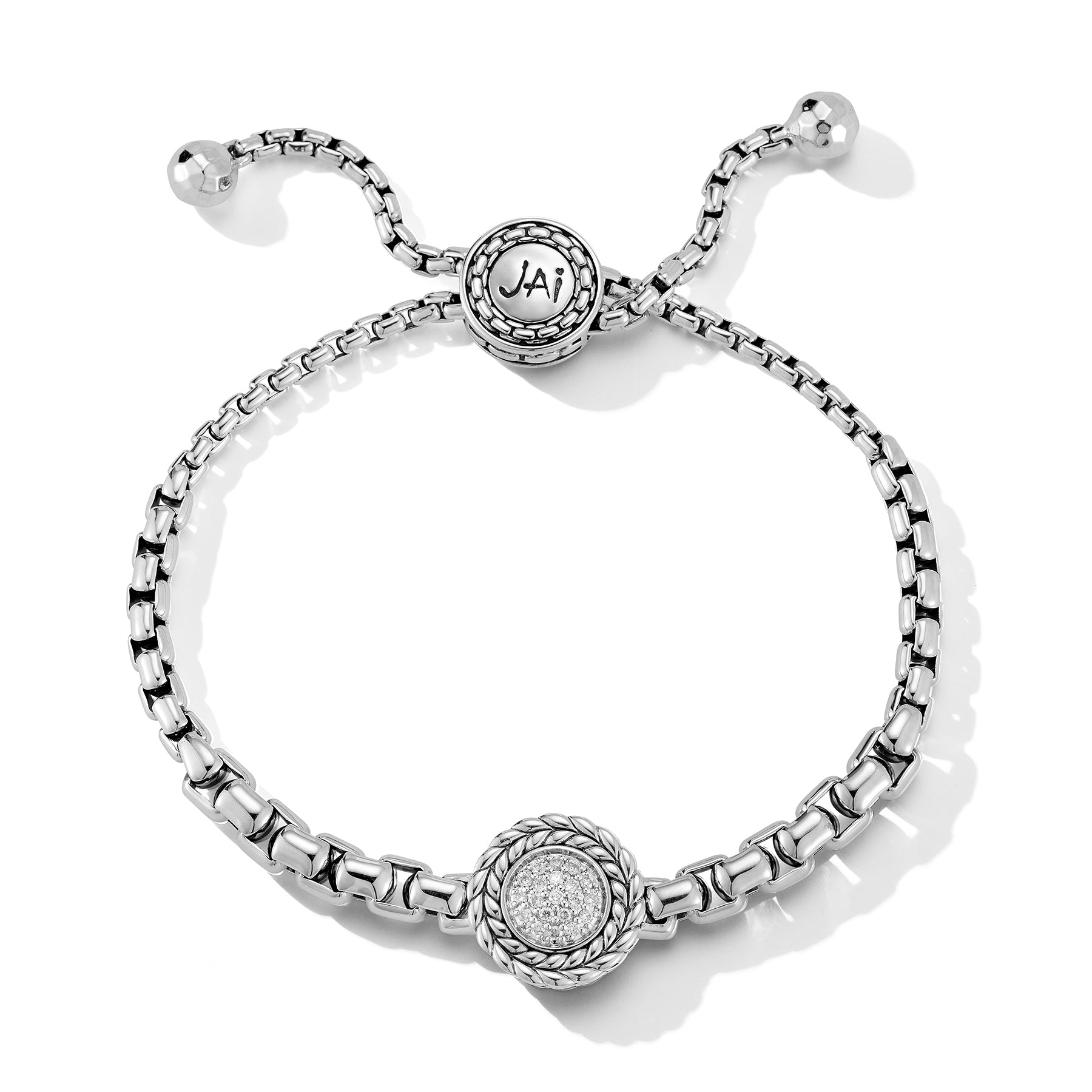 Our Sterling Silver & Diamond Graduated Box Chain Slider Bracelet is centered with a round, Pave Diamond embellished disk, trimmed with Basketweave. Bracelet adjustable sizes:Stone Information:Diamond