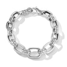 Our Sterling Silver Statement Link Bracelet features graduated rectangular links, which alternate with Box Chain element links for textural contrast.Sizes:Large (8.125"" Length)Medium (7.625"" Length)