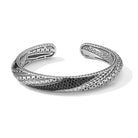 Our Sterling Silver Master Artisan & Gemstone Hinged Cuff Bangle, measuring 10mm in surface width, features our classic textured design elements and an arrangement of 1.5mm round faceted Black Spinel 
